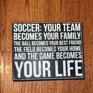 Soccer Your Team Becomes Your Family Distressed Black & White Room Decor Plaque